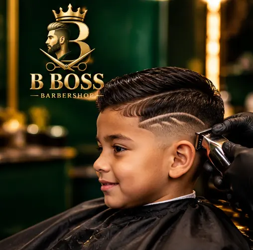 Young client getting a haircut with a shaved design
